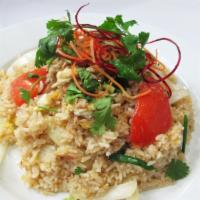Crab Fried Rice · Fried rice with crab meat, eggs, onions and tomatoes. Meat choice is already included.