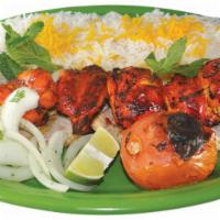 Chicken Kabob · Boneless chicken breast marinated in seasonings and saffron, grilled to perfection. Served w...