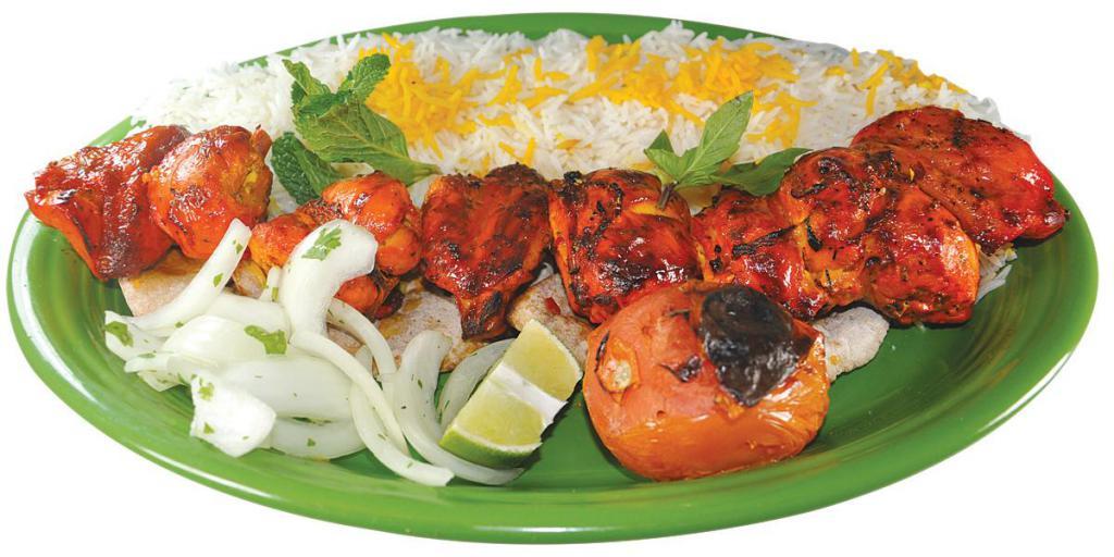 Chicken Kabob · Boneless chicken breast marinated in seasonings and saffron, grilled to perfection. Served with pita bread and rice (substitute Salad or Vegetables for $2.00)