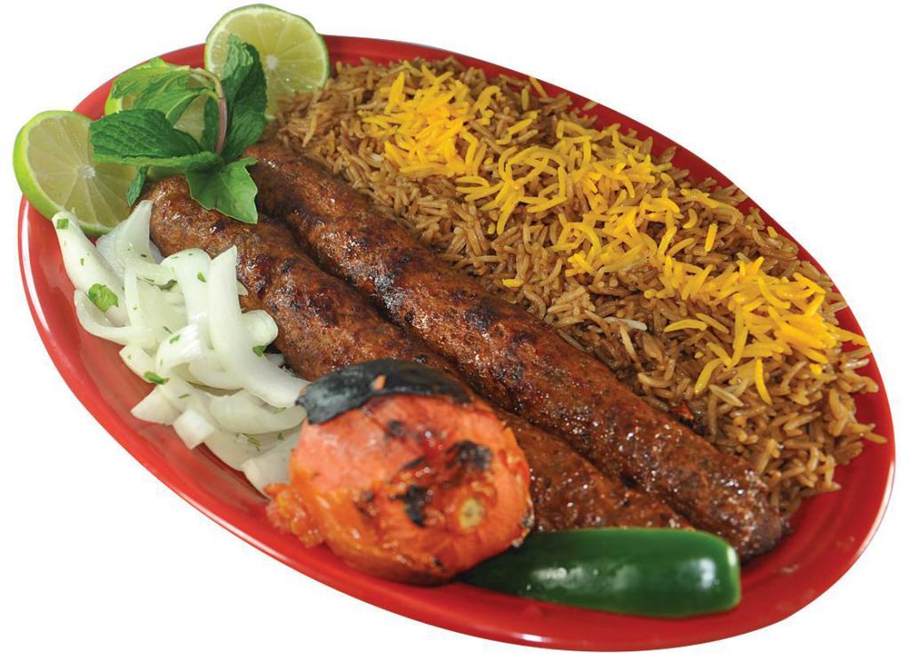 Kobideh · 2 skewers of ground beef or chicken marinated in fresh grated spices and seasonings and grilled to perfection. Served with pita bread and rice (substitute Salad or Vegetables for $2.00)