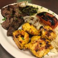 Combination Feast · Combination of shish kabob, kafta kabob, and chicken. Served with rice, salad, and pita bread.