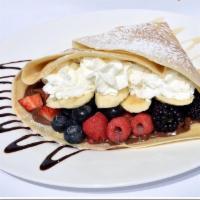 NUTELLA CREPE (most popular) · Strawberry, Banana, Chocolate drizzle and Powdered sugar.