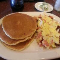 Pancakes Combo · 3 pancakes with two eggs any style and one choice of PORK meat(Bacon. Ham. or Sausage.)  for...
