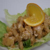 Orange Chicken · Lightly breaded tender pieces of chicken drizzled in our homemade creamy and tangy orange sa...
