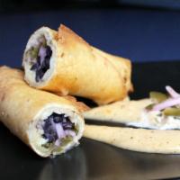 Black Bean-Cheddar Chimichangas (Vegetarian) · Slow-cooked black beans, aged cheddar, pickled red onions and jalepenos, cilantro, lime chil...