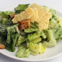 Caesar Salad · Fresh romaine tossed with anchovy-Parmesan based Caesar dressing topped with more Parmesan a...