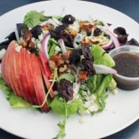 Michigan Salad · Artisan lettuce mixed with red onions and Gorgonzola topped with fresh apple slices, candied...