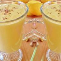 126. Mango Lassi · Traditional Indian yogurt and fresh mango drink.