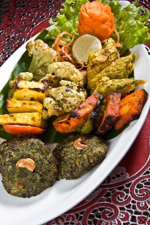 Vegetarian Platter · Assorted vegetable and cheese pakoras, samosas and aloo tikkis. Vegetarian.
