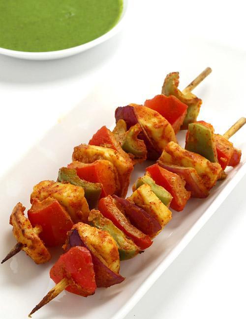 Paneer Tikka Masala · Cubes of homemade cottage cheese, cooked in a velvety tomato base with hint of spice.
