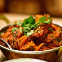 Chicken Jalfrezi · Bonelles white meat cooked with onions, tomato and bell pepper, comes with rice.