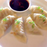 A5. Chicken Dumpling · 6 pieces. Steamed or fried pot stickers filled with chicken and veggies served with soy vina...