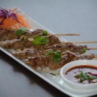 A9. Grilled Pork Skewers · 4 pieces. Sliced, marinated, skewered and grilled meat-on-stick served with homemade sweet a...