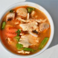 S1. Shrimp Tom Yum Soup · Hot and sour soup with lemongrass, lime juice, fresh and dry chili, cilantro, onion, mushroo...