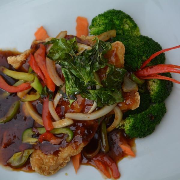 SP2. Spicy Cat Fish · Fried crispy cat fish with steamed broccoli, carrot and cabbage in Thai spicy sweet basil sauce.