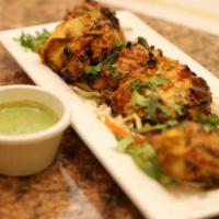 Hariyali Kabab · Tender cubes of boneless chicken, marinated in yogurt and a variety of green herbs and char ...