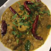 Veggie Korma · A classic south Indian style curry made with a variety of fresh vegetables braised in a spic...