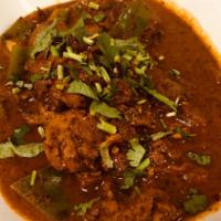 Kadai Chicken · Chunks of boneless chicken, whole Indian spices and fresh peppers cooked in an onion and tom...