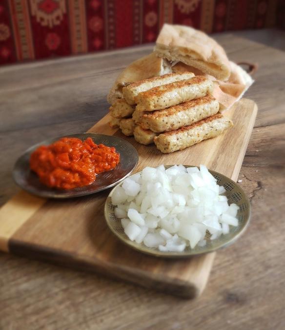 New Item! Chicken ćevapi (10 pcs)  · Traditionally seasoned chicken kebabs. 10 pcs. Served in a pita with onions and Ajvar 