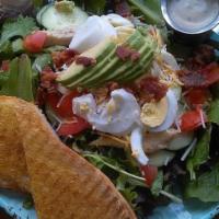 Cobb Salad · Mixed greens, diced chicken, boiled egg, crumbled blue cheese, tomato, topped with avocado a...