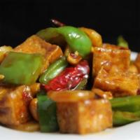 4. Kung Pao Tofu · Fried tofu with peanuts, green bell peppers, water chestnuts and chili peppers stir-fried in...
