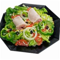 Chef Salad · House salad with ham and turkey.