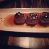 Beef Negimaki · Thinly shaved beef rolled with scallion.