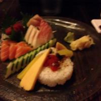 Chirashi · 15 pieces of sashimi, Japanese pickles and tamago over sushi rice.