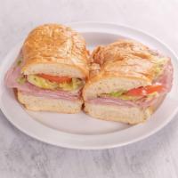 Cold Cut Sandwich · Ham, mortadella, salami, provolone cheese with lettuce, tomato and Italian dressing on Frenc...