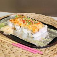 Volcano Roll · IN : Crab Meat, Avocado / TOP : Shrimp, Crab Meat, Scallop, Tobiko, Spicy Mayo.