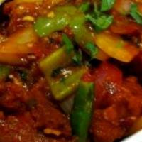 Chili Chicken · Boneless chicken cooked in a fiery dry sauce with chills, onions, bell pepper, garlic and so...