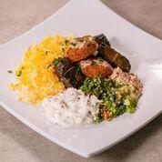 Veggie Platter · Vegetarian Platter served with 2 dolmas, 2 falafel patties, basmati rice, hummus, tabbouleh ...