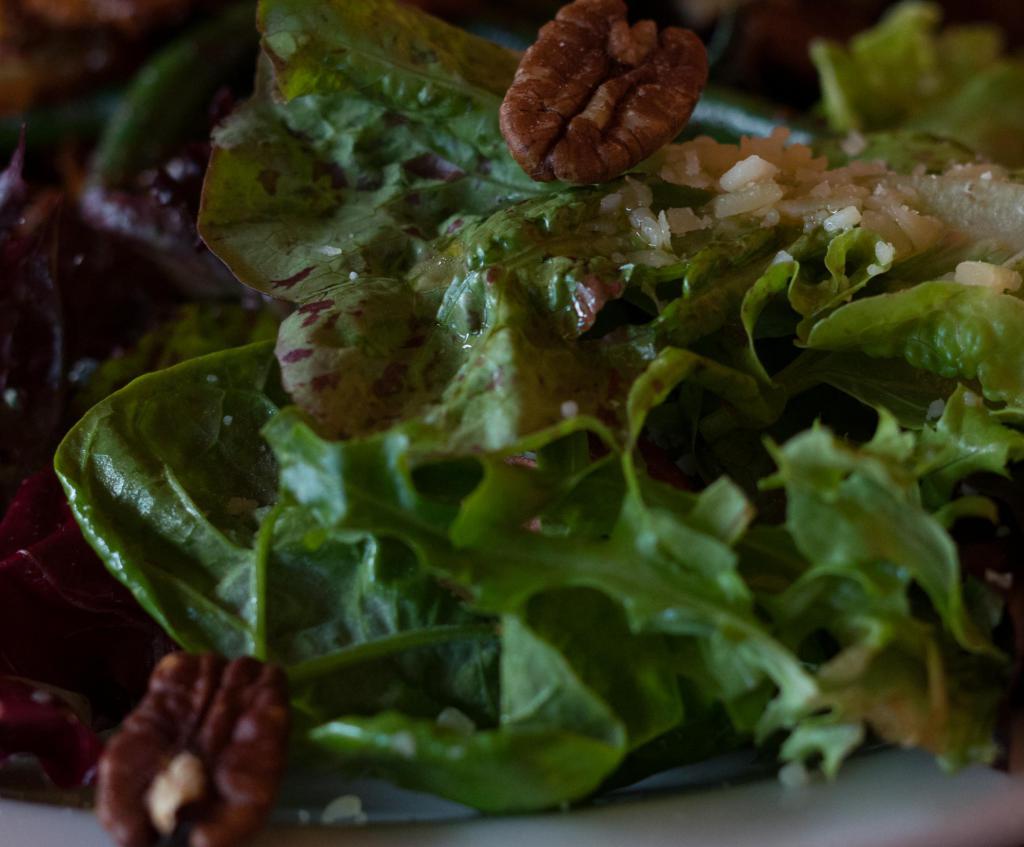 B&I House Salad · Late Harvest Riesling vinaigrette, toasted pecans, and Parmesan.