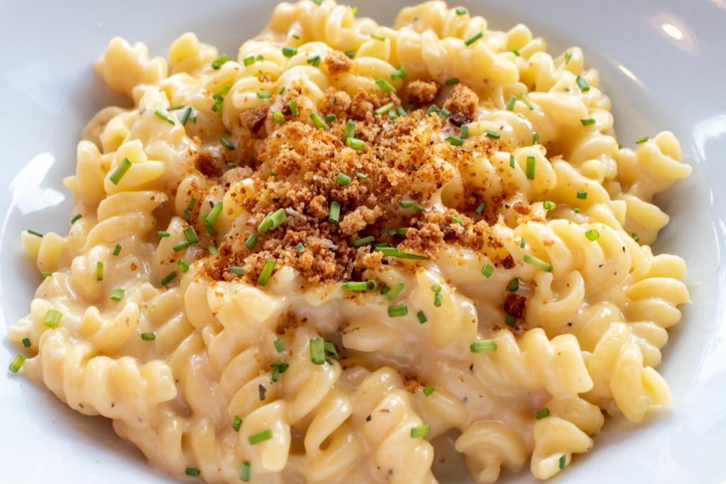 Mac and Cheese Lunch · Fusilli pasta tossed with garlic, herbs, cream, jack, cheddar and Parmesan cheese. Topped with herbed toasted bread crumbs.