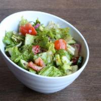Garden Salad · Romaine lettuce, tomatoes, Persian cucumbers, and red onions tossed with house dressing. Veg...