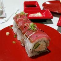 Pepper Tuna Roll · Raw. Seared tuna, crab salad, cucumber, and Japanese dressing.