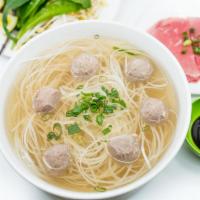 4. Large Steak and Beef Balls Pho Noodle Soup · Vietnamese pho noodle soup served with steak and beef ball, rice noodle, garnished with gree...