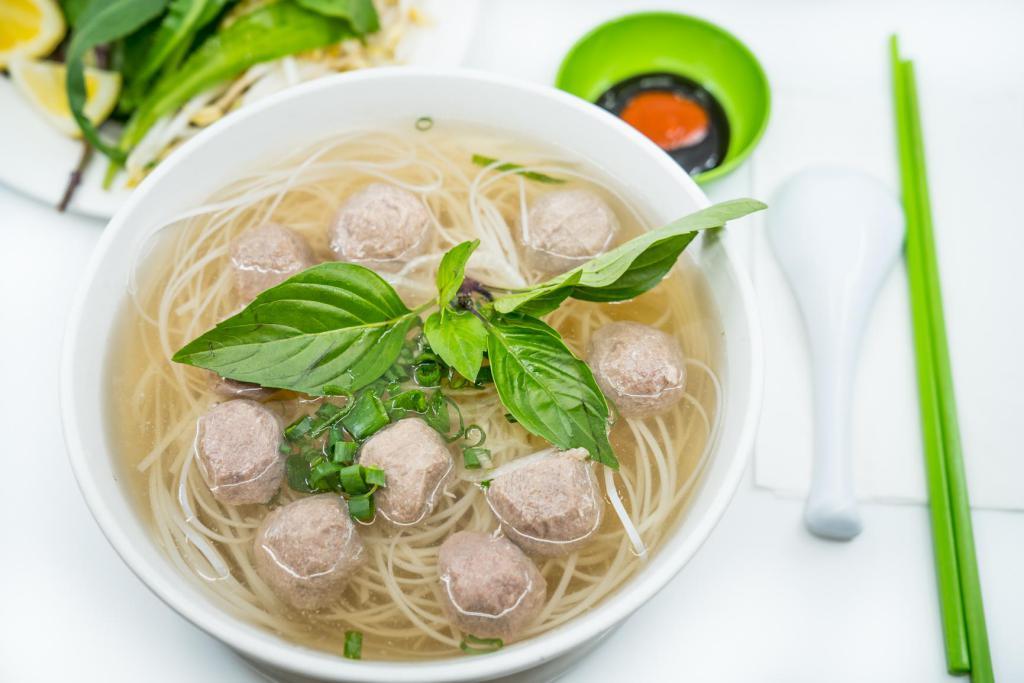 5. Large Beef Balls Pho · Vietnamese pho noodle soup served with beef ball, rice noodle, garnished with green and white onion.