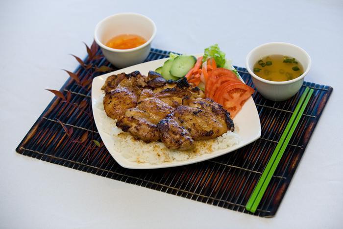 BBQ Chicken Rice Plate · Rice plates (com phan) includes steamed white jasmine or brown rice and tossed salad.