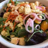 Seasonal Mixed Green Salad · House made dressings served on the side