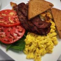 Breakfast Special · 3 organic eggs any style with turkey bacon or sausage and home fries.