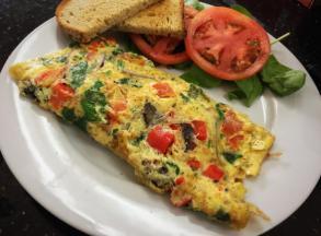 Fresh Start Omelet · Organic eggs, tomatoes, portobello mushrooms, Monterey Jack cheese, red onions, bell peppers and spinach.