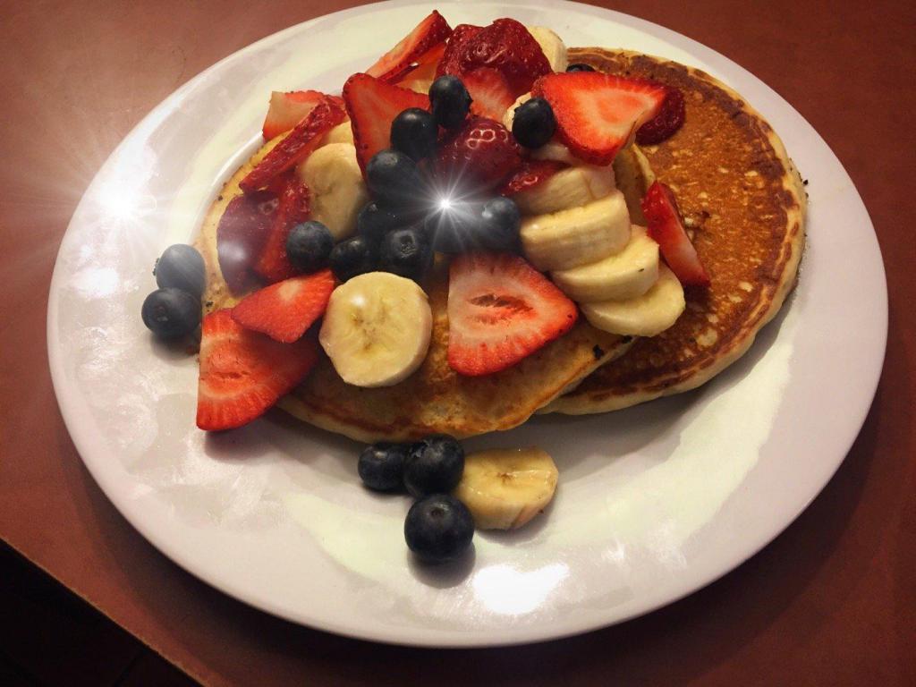 Homemade Pancakes · Fresh fruits, walnuts, raisins or cranberries. Served with maple syrup.
