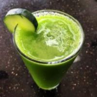 Migraine Reliever Juice · Pineapples, kale, celery, cucumbers and lemon.