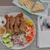 Gyro Salad · An athena Greek salad with shaved gyro meat. Served with tzatziki sauce, our Greek dressing ...