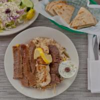 Athena Greek Feast Platter · Chicken souvlaki, beef souvlaki and gyro with tzatziki. Served with a side of Greek salad, r...
