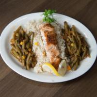 Grilled Salmon Platter · Fresh grilled salmon-served with rice, vegetables and lemon. Served with a side of Greek sal...
