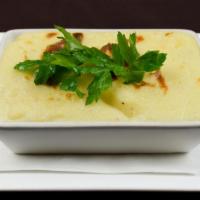 Pure De Papas · Yukon gold mashed potatoes.