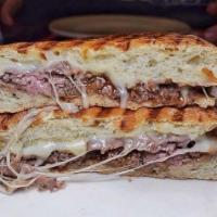 The Joe D Sandwich · Hot roast beef with gravy and melted mozzarella.
