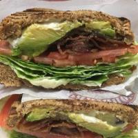 BLT Sandwich · Bacon, lettuce and tomato on white toast with mayonnaise.